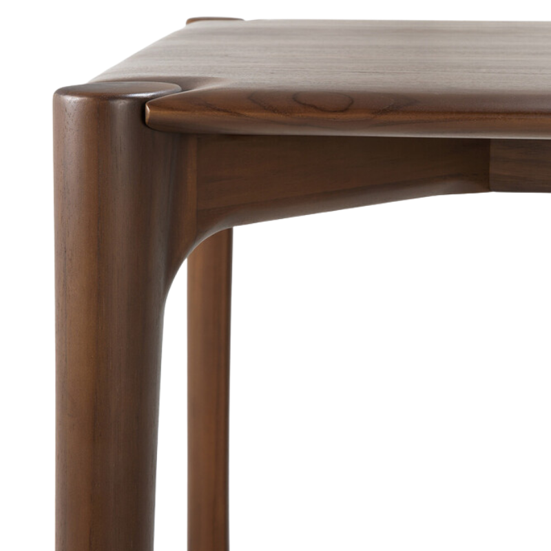 The Teak Brown PI Dining Table by Ethnicraft from the corner close-up. all-groups