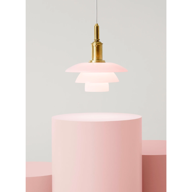 the PH 3/3 Pale Rose Pendant boasts beautiful, mouthblown pale rose glass shades, that are sandblasted on the underside to provide optimal light.