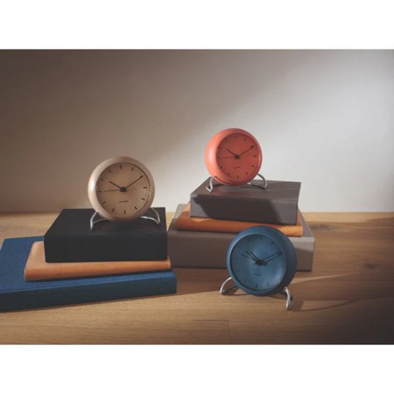 The City Hall Alarm Clock from Arne Jacobsen Clocks in a living room. all-groups