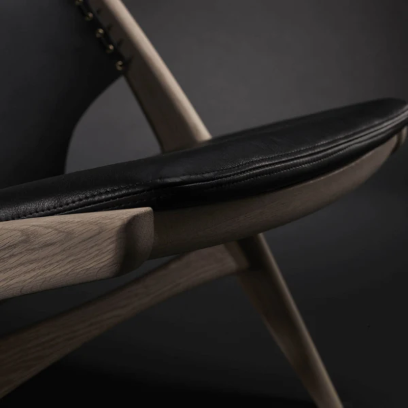 The Krysset Lounge Chair from Eikund of Norway in a close up shot.