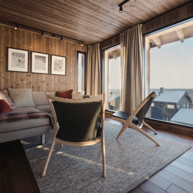 The Krysset Lounge Chair from Eikund of Norway in a family space.