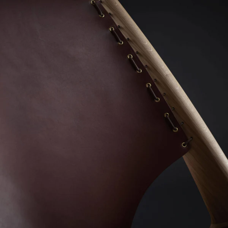 The Krysset Lounge Chair from Eikund of Norway focusing on the leather.