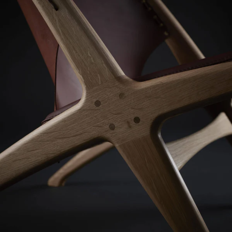 The Krysset Lounge Chair from Eikund of Norway in a studio.