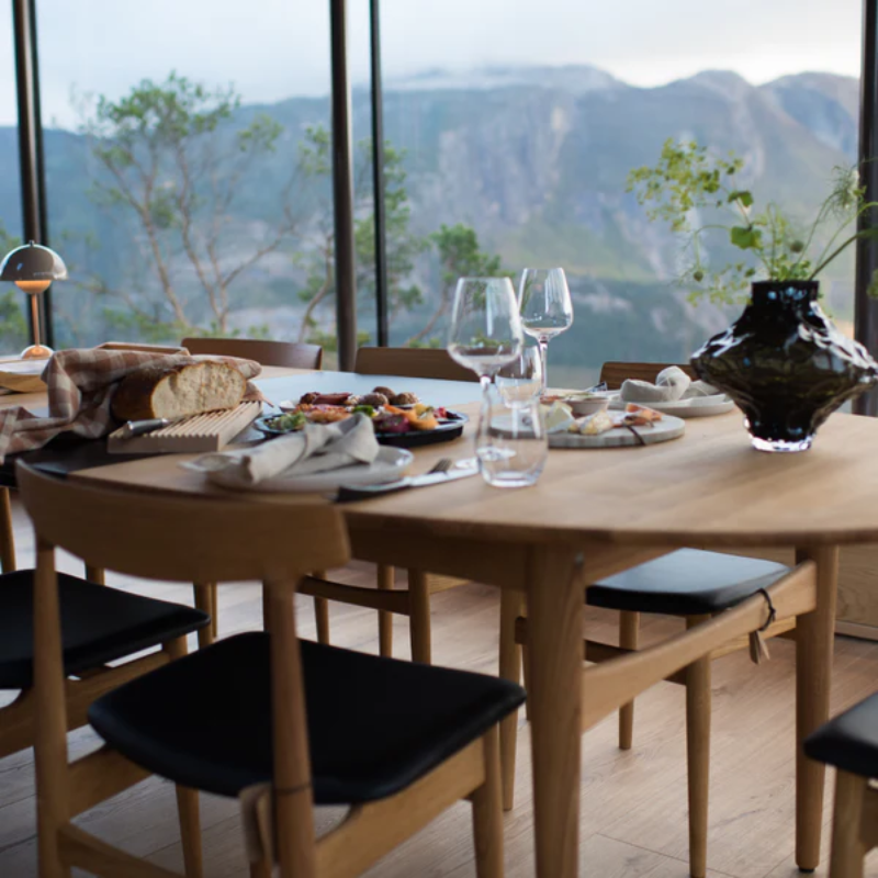 The Øya Dining Table from Eikund of Norway in a family space.