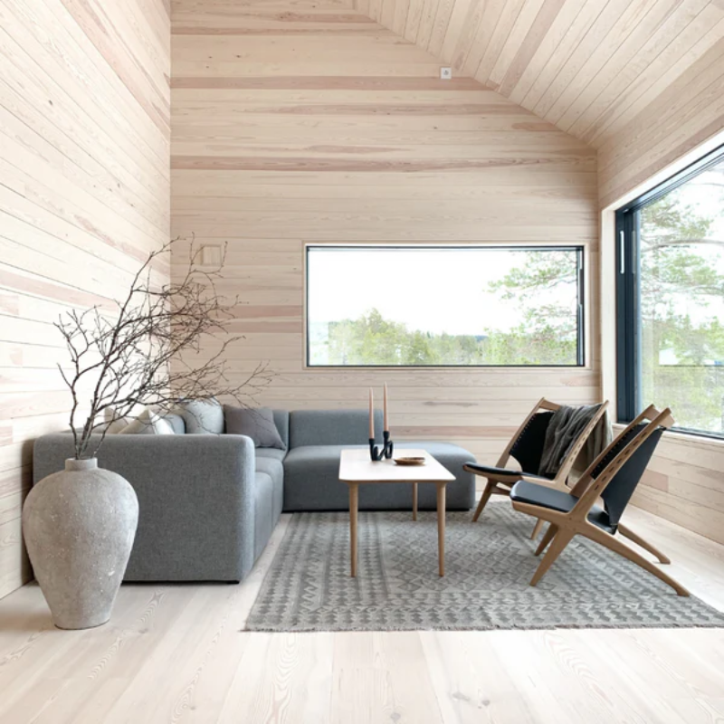 The Rectangular Evja Coffee Table from Eikund of Norway in a living room.