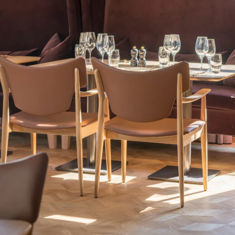 The Veng Armchair from Eikund of Norway in a living room.