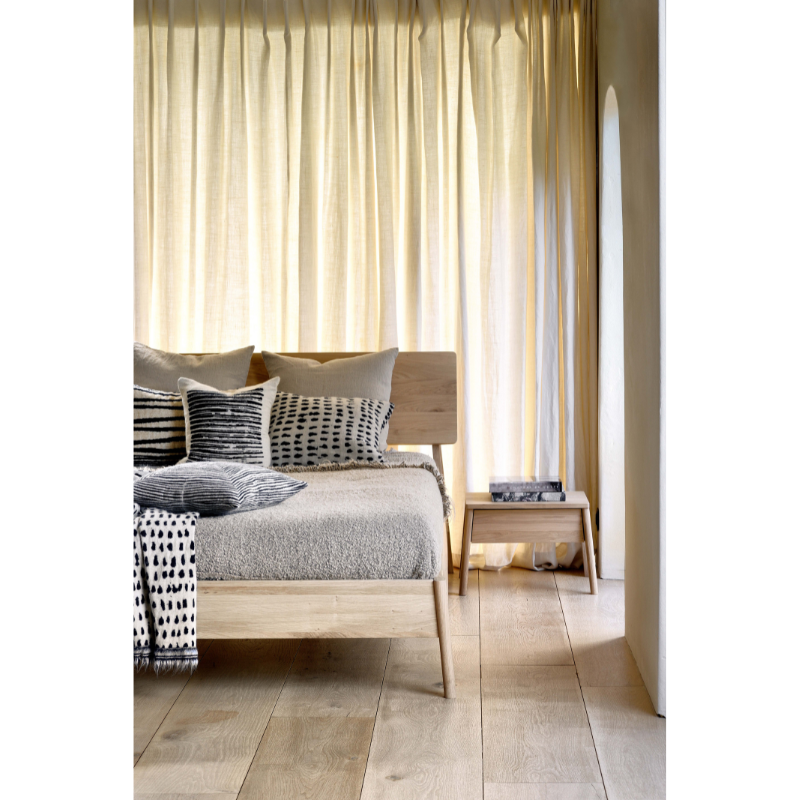 The name 'Air Bed' says it all: the idea was to add softness, roundness and overall lightness to the usual concept of a bed. Ethnicraft’s Air bed in solid oak manages to look sturdy yet light at the same time.