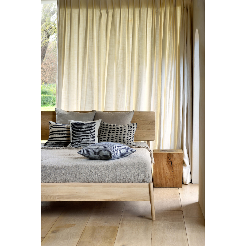 The name 'Air Bed' says it all: the idea was to add softness, roundness and overall lightness to the usual concept of a bed. Ethnicraft’s Air bed in solid oak manages to look sturdy yet light at the same time.