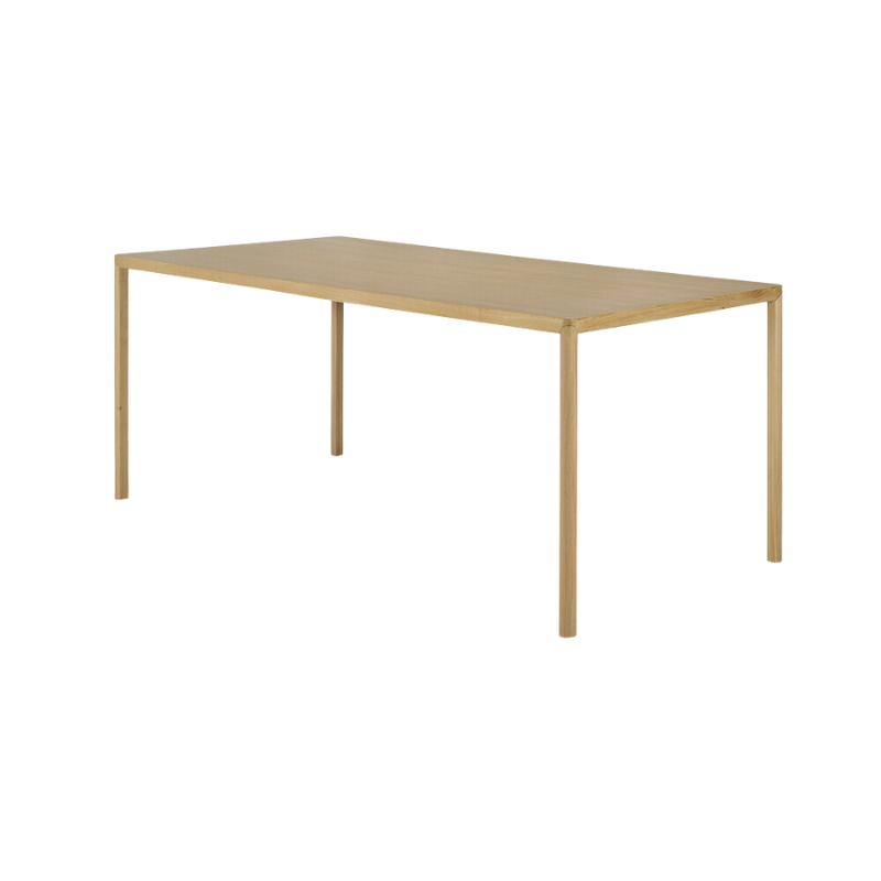 The Air Dining Table from Ethnicraft in the 71 inch size from a side angle.