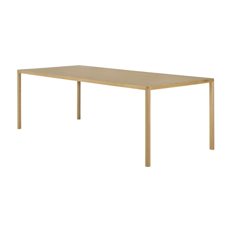 The Air Dining Table from Ethnicraft in the 87 inch size from a side angle.