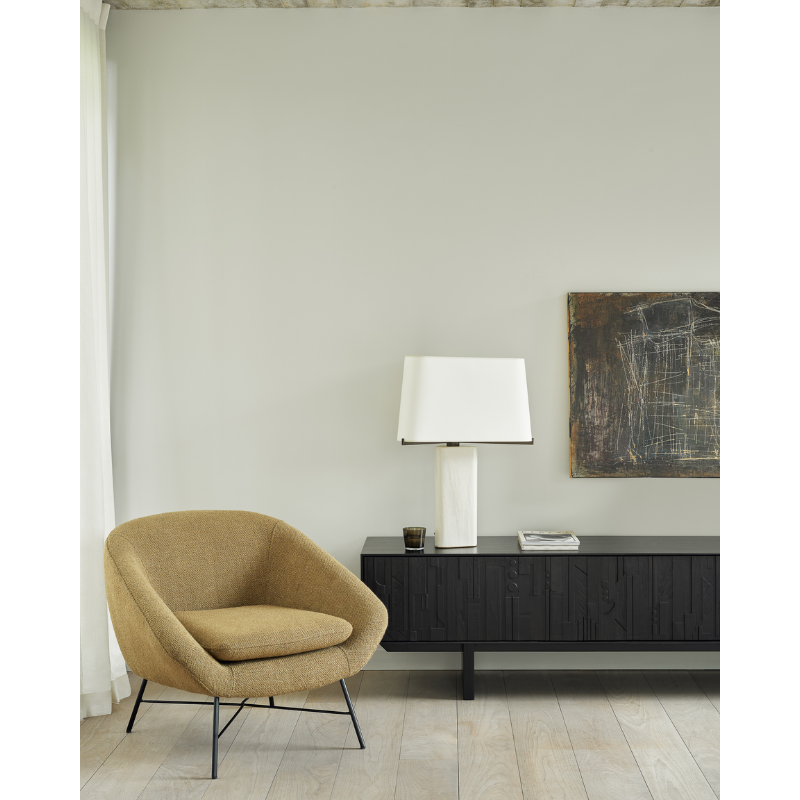 The Barrow Lounge Chair from Ethnicraft in a family area.