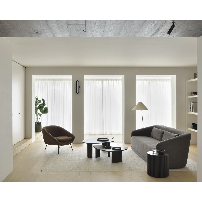 The Barrow Lounge Chair from Ethnicraft in a living room.