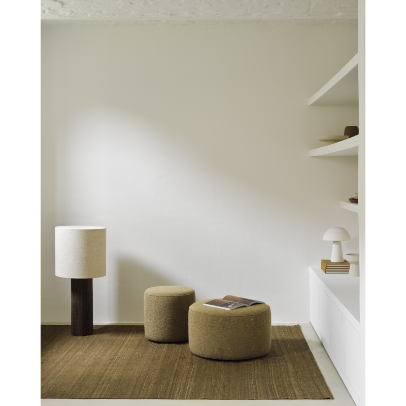 The Barrow Pouf by Ethnicraft in both large and small tucked away in the corner of a quiet study.