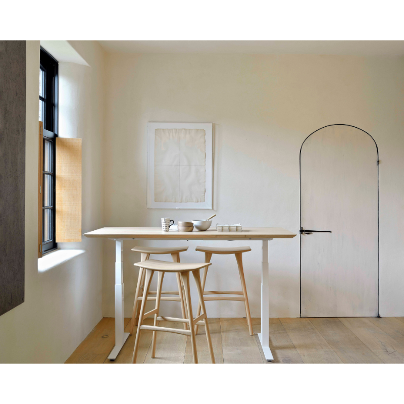 The table top for the Bok Adjustable Desk from Ethnicraft in a family space lifestyle shot. Please note this listing does not include the base and is the table top only.