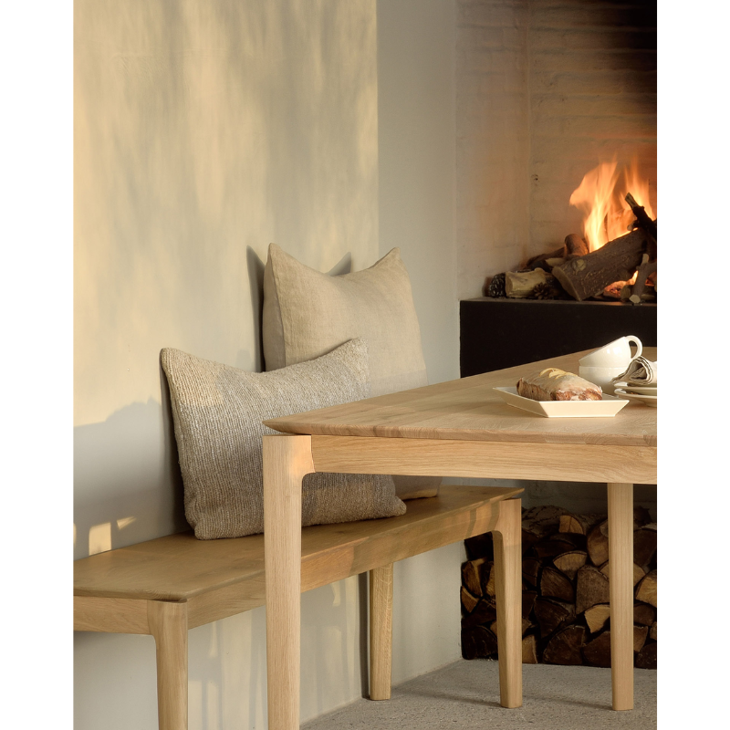 The Bok Bench from Ethnicraft in a dining room.