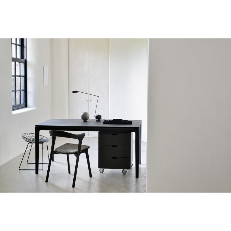 The Bok Dining Chair from Ethnicraft in a home office space.