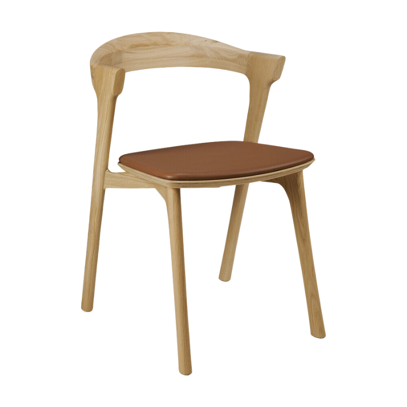 The Bok Dining Chair from Ethnicraft in oak with cognac leather upholstery.