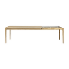 The Bok Extendable Dining Table from Ethnicraft in oak which extends from 71 to 110 inches.