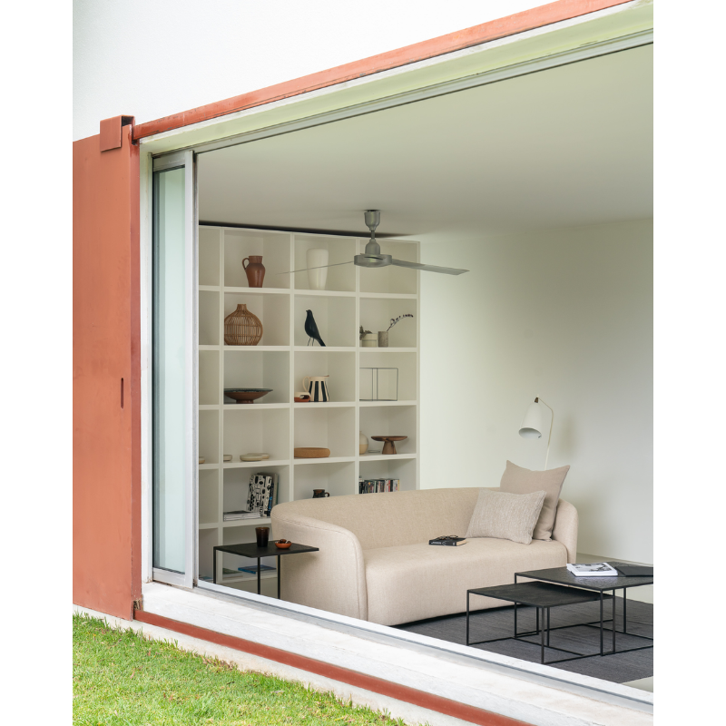 The Ellipse Sofa from Ethnicraft within a bedroom.