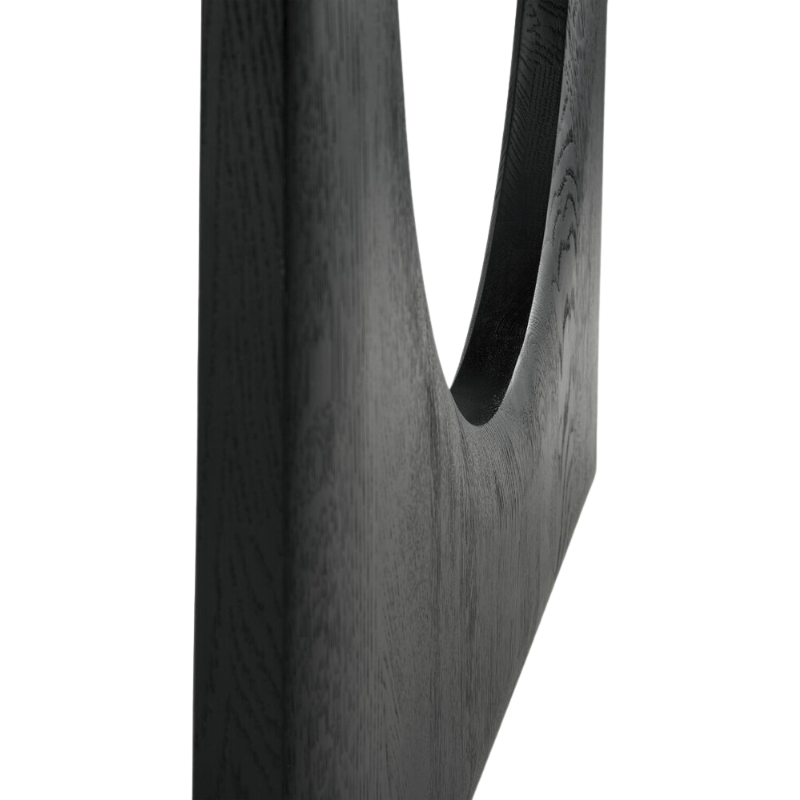 The Geometric Dining Table from Ethnicraft in solid oak tainted black.