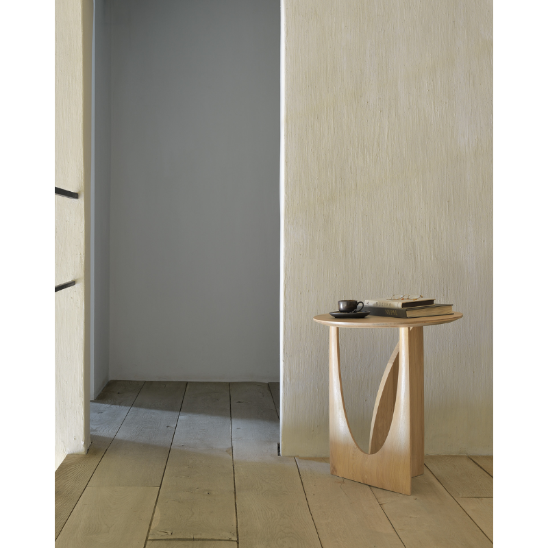 The Geometric Side Table from Ethnicraft in an entryway.