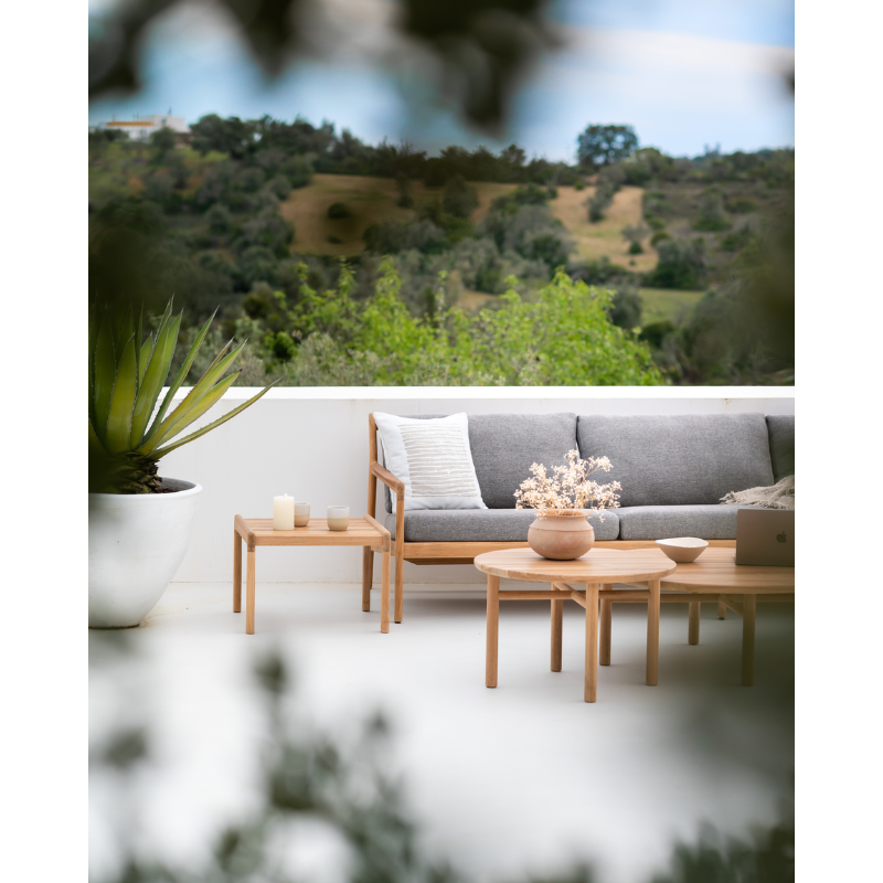 The Lines Outdoor Cushion from Ethnicraft in an outdoor living space lifestyle photograph.
