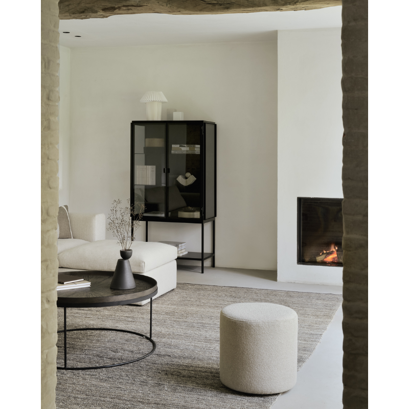 The Mellow Footstool from Ethnicraft in a family area.