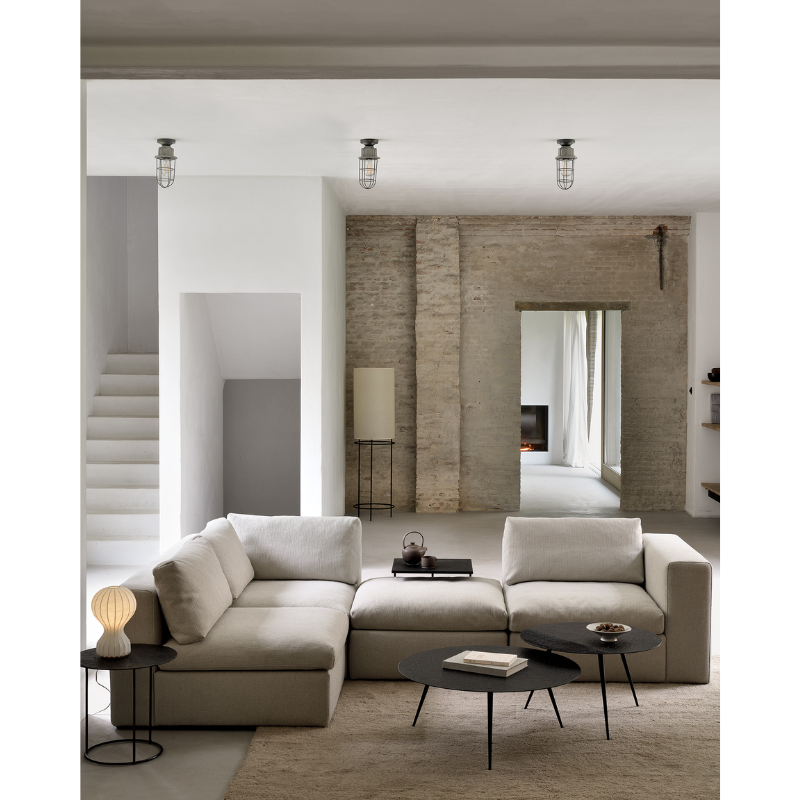 The Mellow Footstool from Ethnicraft in a living room.