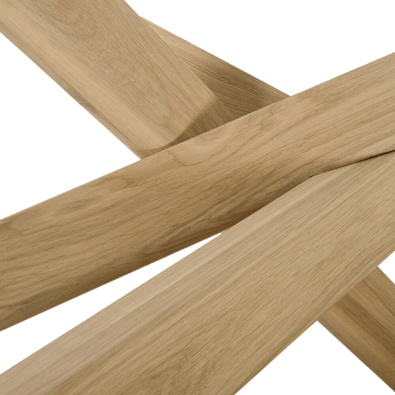 The Mikado oval dining table, designed by Alain van Havre, has been one of our most recognizable designs for years. Its sculptural character is the result of a quest to find a balance between functionality and stability. Mikado’s legs interlock like a well-thought-out puzzle. By exchanging the rectangular tabletop with an ellipse, we increase togetherness and connection. It's easier to interact with your guests, allows you to converse with everyone, and seats over a dozen people comfortably.