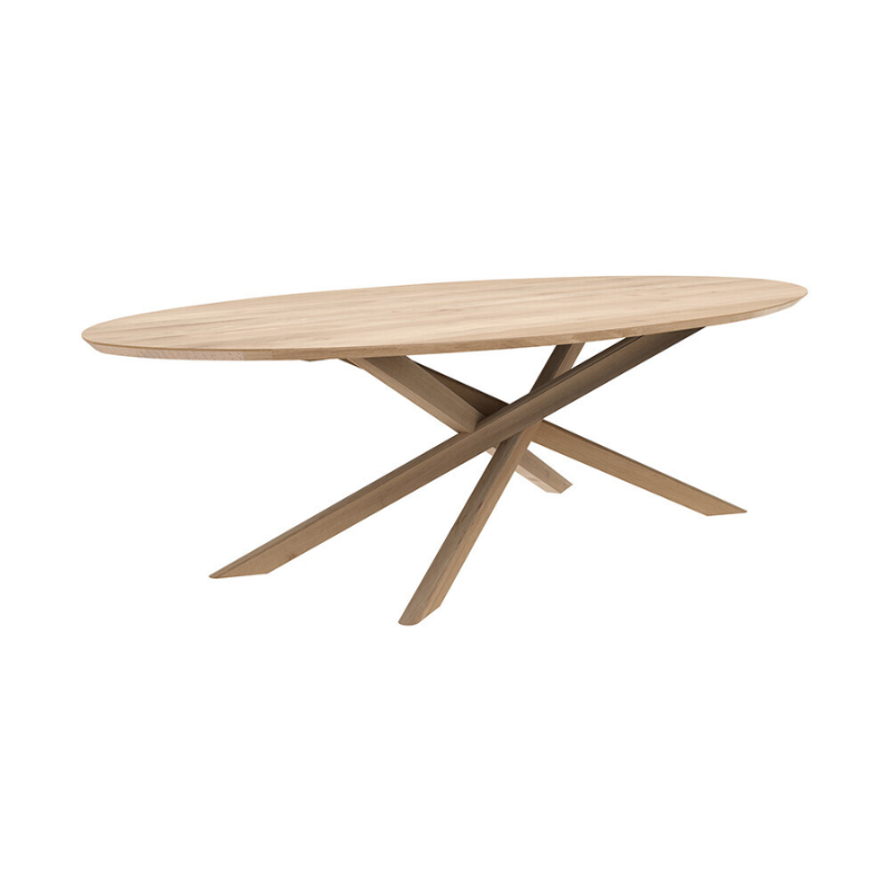 The Mikado oval dining table, designed by Alain van Havre, has been one of our most recognizable designs for years. Its sculptural character is the result of a quest to find a balance between functionality and stability. Mikado’s legs interlock like a well-thought-out puzzle. By exchanging the rectangular tabletop with an ellipse, we increase togetherness and connection. It's easier to interact with your guests, allows you to converse with everyone, and seats over a dozen people comfortably.