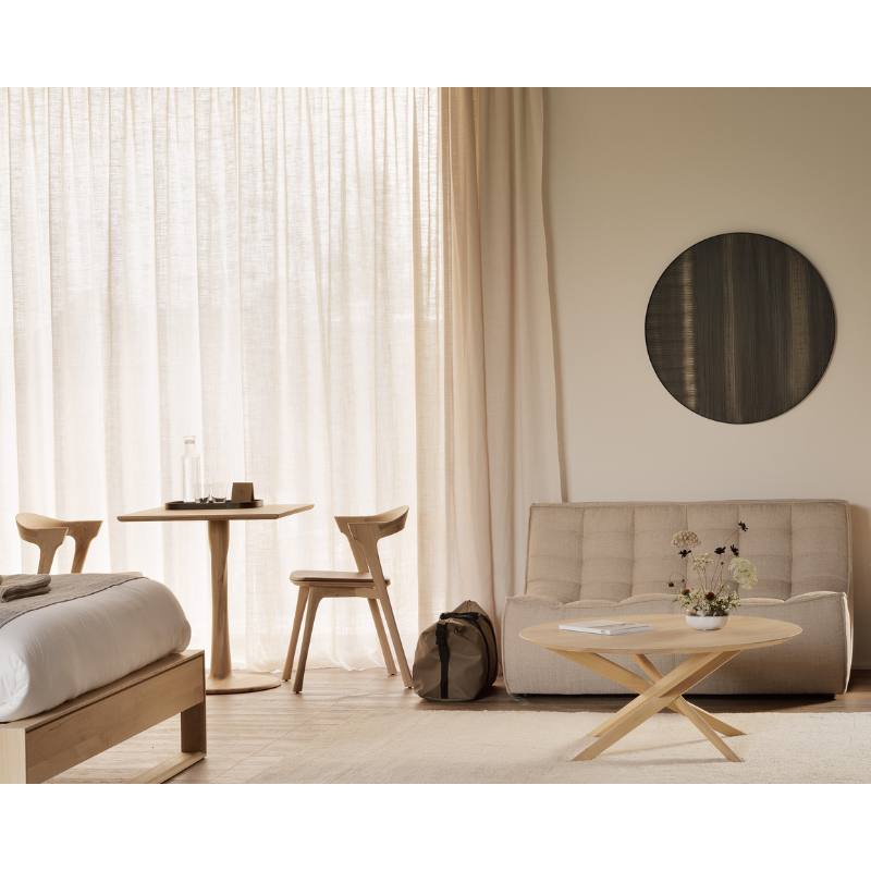 The Mikado round coffee table, designed by Alain van Havre, is not simply a smaller version of the Mikado dining table. It's a complete reinterpretation of its larger design and a study of balance and symmetry.