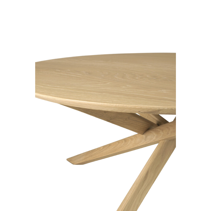 The Mikado round coffee table, designed by Alain van Havre, is not simply a smaller version of the Mikado dining table. It's a complete reinterpretation of its larger design and a study of balance and symmetry.