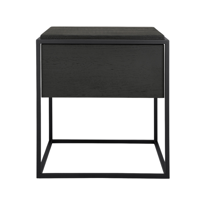 Practicality without sacrificing style. The minimalistic Monolit bedside table offers ample storage and serves as a convenient stand for bedside essentials.