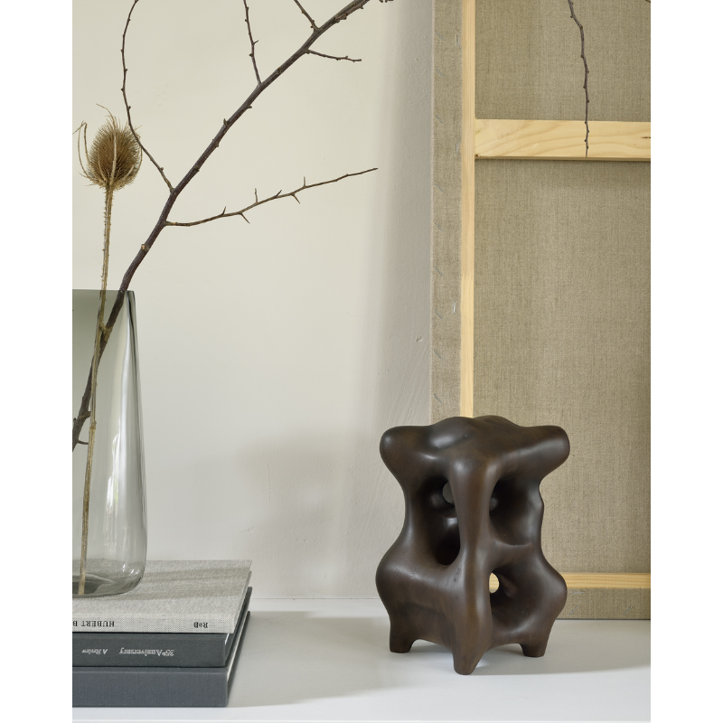 The contemporary sculptures series was crafted by our in-house master sculptor, Hartoyo. In each piece, the solid sycamore wood is sublimed into geometric and organic shapes. Beautiful from every angle and with the changing light of the day, these intriguing pieces will layer meaning into your home.