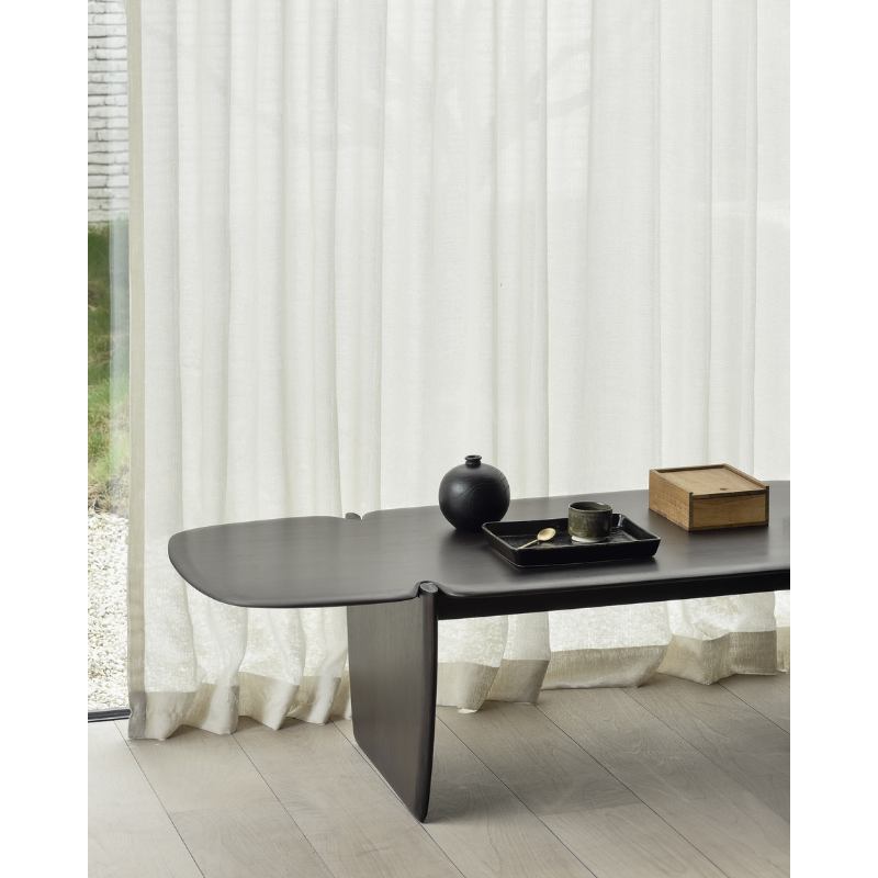 The PI Coffee Table from Ethnicraft in a close up showing the detail of the table in a lifestyle shot.