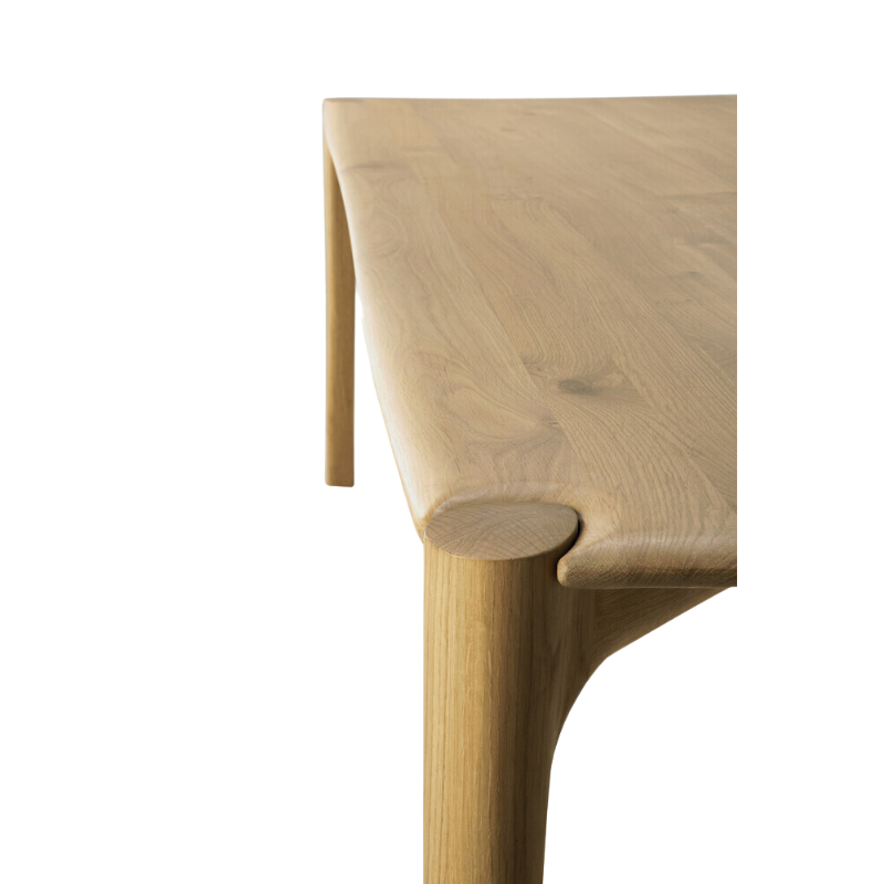 The PI collection honors nature’s design by keeping the strength, curves and lines, as nature intended. Interesting shapes are discovered in this sleek and stylish, polished imperfect, finish. Each PI item is finished by hand to ensure that the individual character of the wood is respected. The PI dining table offers a balanced place to gather and share memories with loved ones.