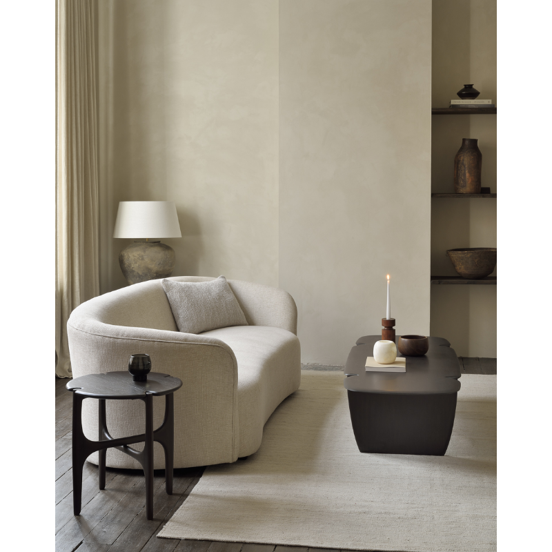 The PI Side Table from Ethnicraft in a lounge with the PI Coffee Table and a sofa.