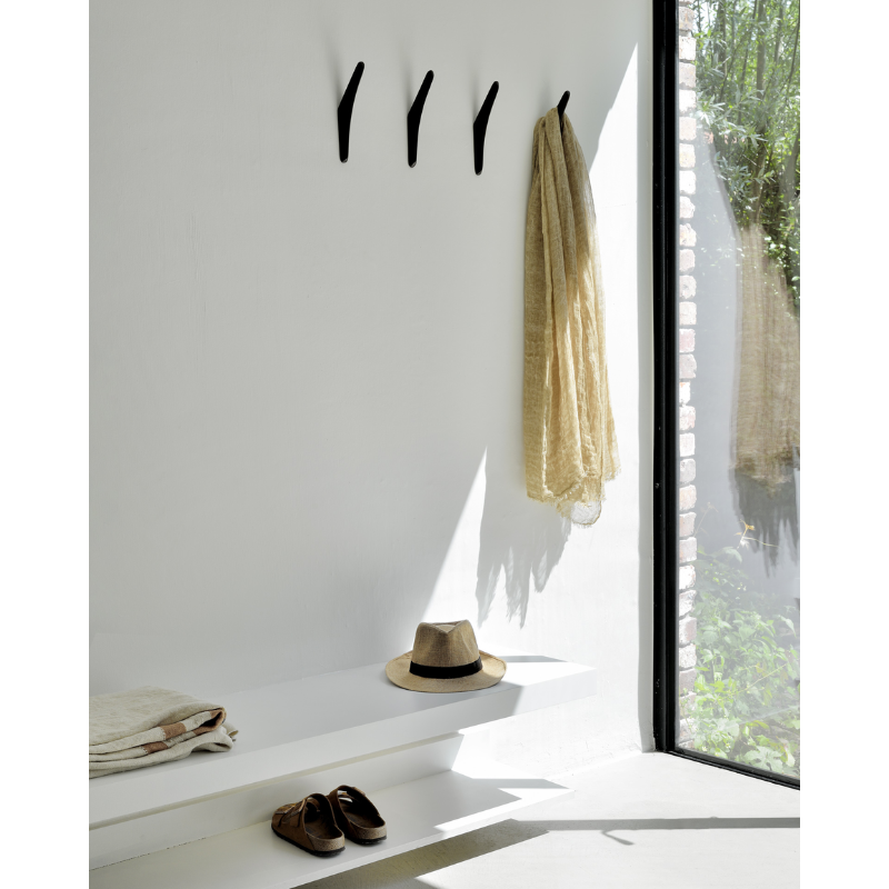 The PI collection honours nature’s design, by keeping the strength and curves as nature intended. Each PI wall hanger is finished by hand to ensure that the individual character of the wood is respected. Interesting shapes are discovered in this sleek and stylish, polished imperfect, finish. Sold as a set of two.