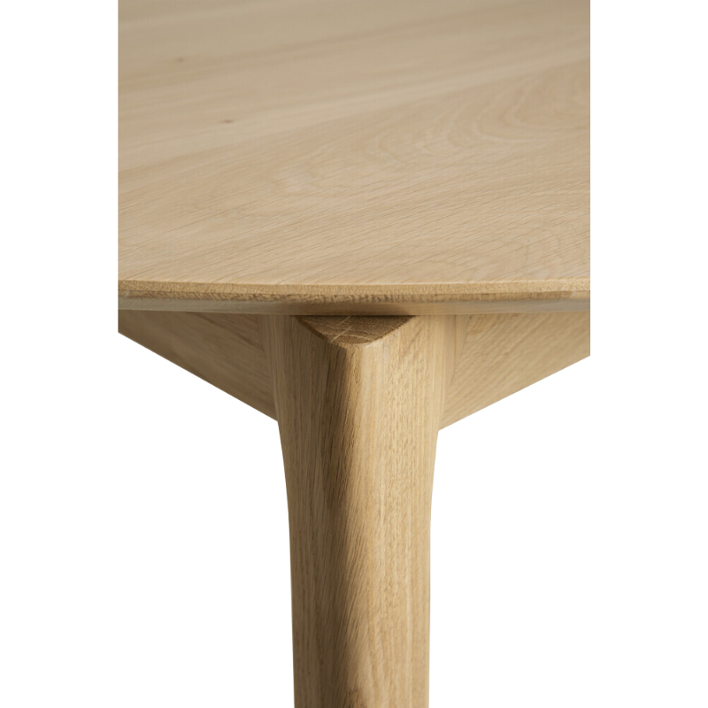 The Round Bok Extendable Dining Table from Ethnicraft in solid oak.