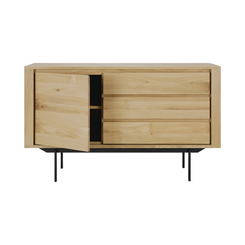 The Shadow sideboard is straightforward and robust with decisive lines. This more recent design with black metal legs, giving the design room to breathe, elevates this sideboard to new heights.