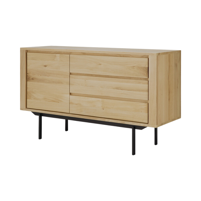 The Shadow sideboard is straightforward and robust with decisive lines. This more recent design with black metal legs, giving the design room to breathe, elevates this sideboard to new heights.