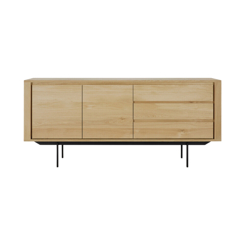 The Shadow sideboard is straightforward and robust with decisive lines. This more recent design with black metal legs, giving the design room to breathe, elevates this sideboard to new heights.