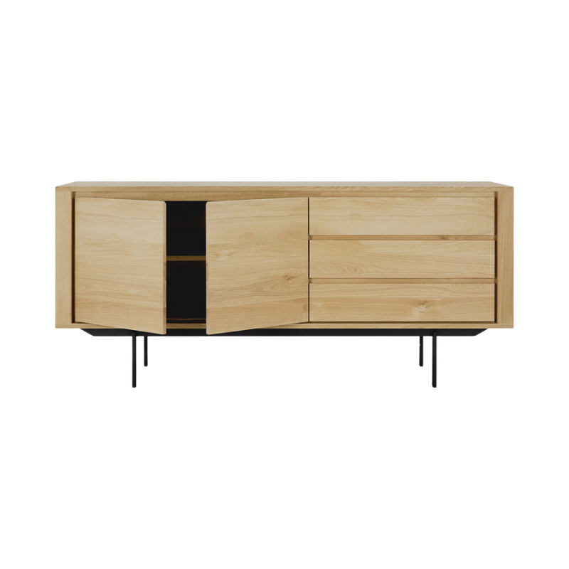 The Shadow sideboard is straightforward and robust with decisive lines. This more recent design with black metal legs, giving the design room to breathe, elevates this sideboard to new heights.