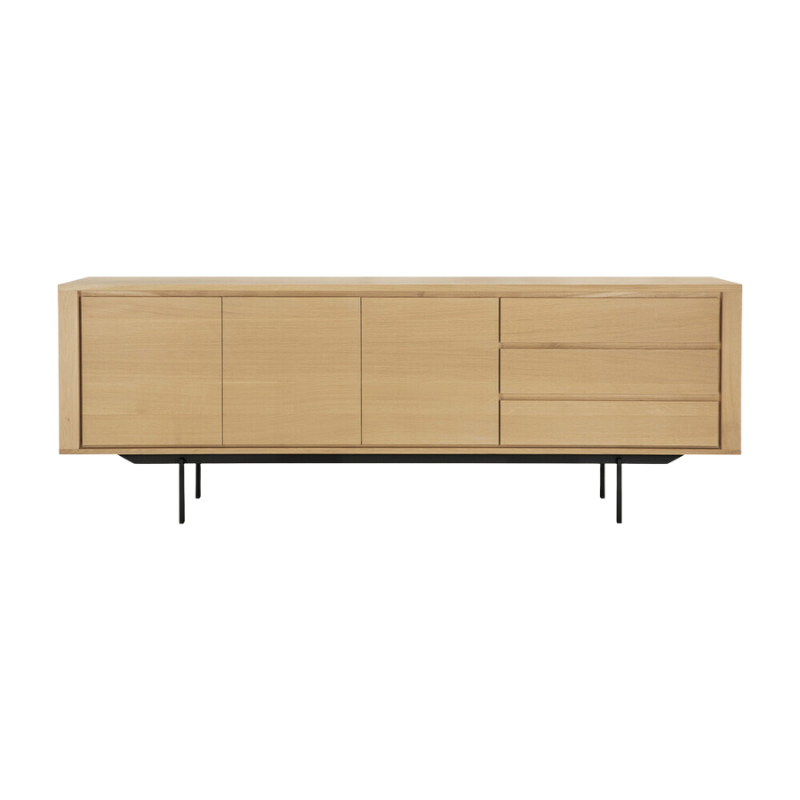 The Shadow sideboard is straightforward and robust with decisive lines. This more recent design with black metal legs, giving the design room to breathe, elevates this sideboard to new heights.
