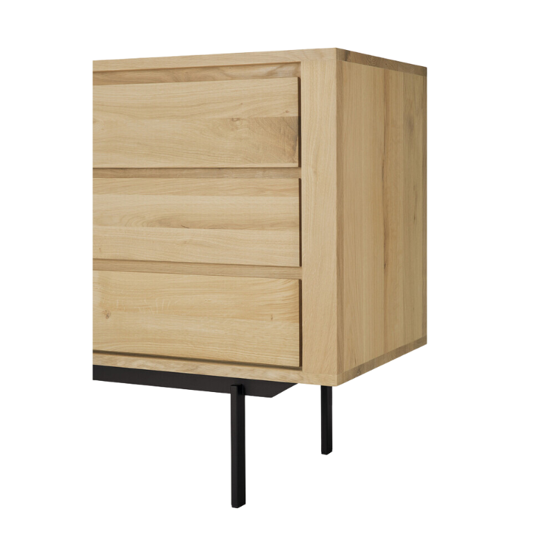 The Shadow sideboard is straightforward and robust with decisive lines. This more recent design with black metal legs, giving the design room to breathe, elevates this sideboard to new heights.