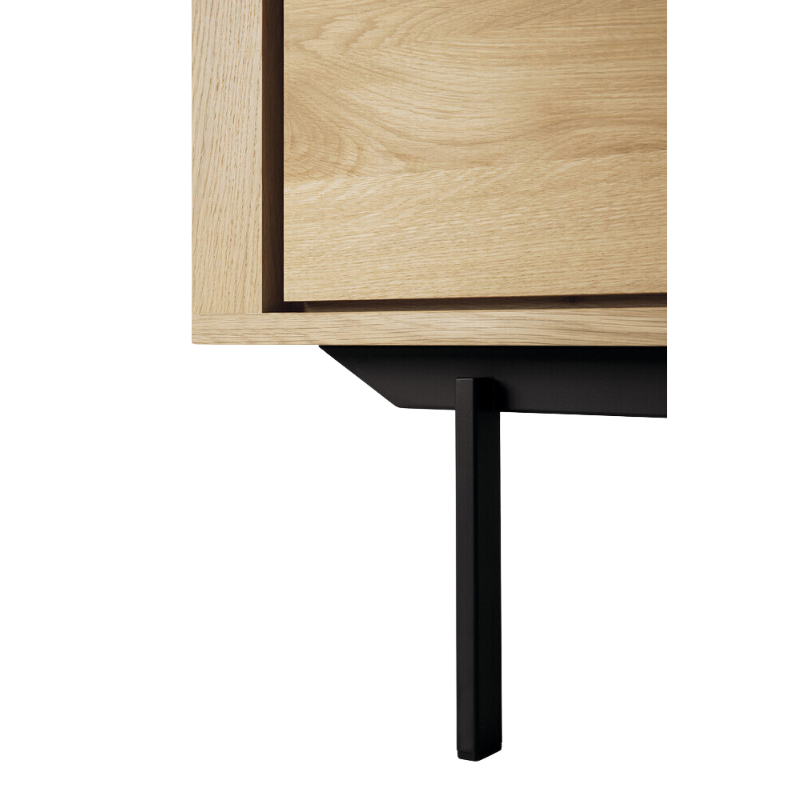 The Shadow sideboard is straightforward and robust with decisive lines. This more recent design with black metal legs, giving the design room to breathe, elevates this sideboard to new heights.