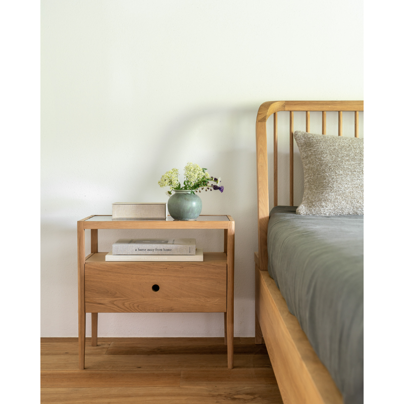 With its one drawer, open space and slightly tapered legs, the Spindle bedside table is the perfect no-nonsense companion for the striking Spindle bed.