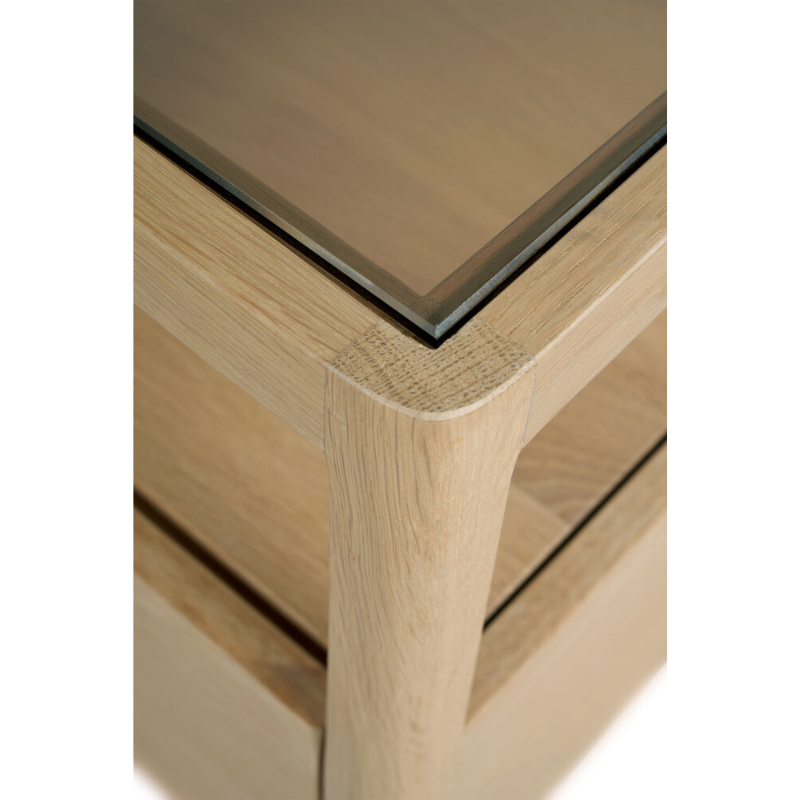 With its one drawer, open space and slightly tapered legs, the Spindle bedside table is the perfect no-nonsense companion for the striking Spindle bed.