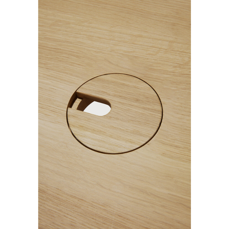 The U Desk from Ethnicraft in oak in a close up shot.