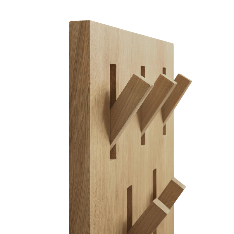 The Oak Utilitile perfectly combines form and function. This minimalistic solid oak coat hanger is a great option to elevate your hallway and optimize wall space to hang your coats and accessories.